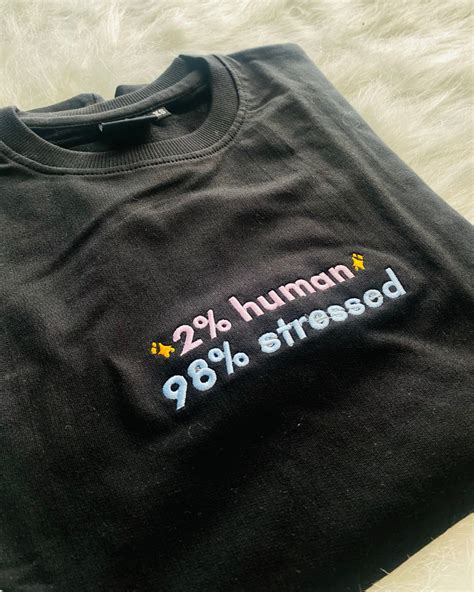 2% HUMAN EMBROIDERED OVERSIZED TSHIRT IN BLACK – Label Bombae