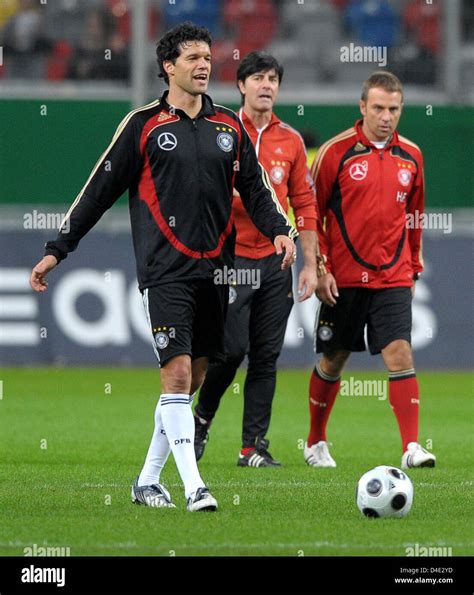 German national soccer player Michael Ballack (L-R), Coach Joachim Loew ...