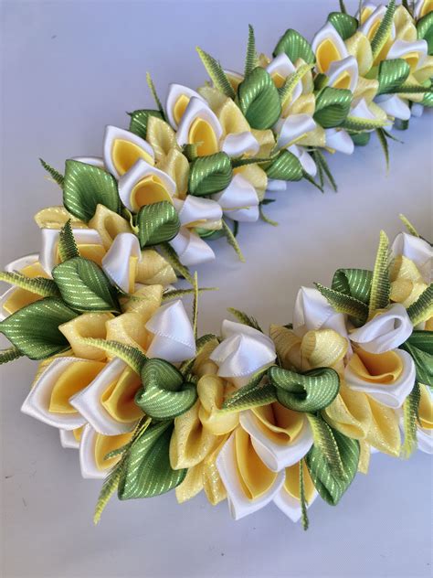 Do it yourself flower ribbon lei with youtube step by step explanation. Long lasting memorable ...