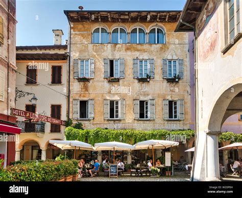 Restaurants at Piazza Motta in Orta San Giulio at Orta Lake in Italy ...