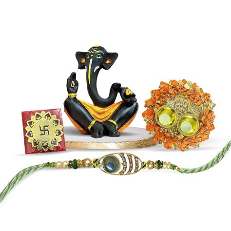Buy Xtore Morpankh Design Rakhi with Ganesha Idol Combo Set | Ganesha ...