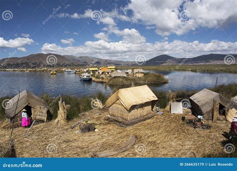 Uros, Peru - Jan 5, 2019. Traditional Totora Boat with Tourists on ...