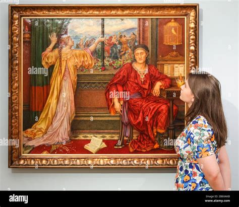 London, UK. 12th Mar, 2020. An assistant poses with Evelyn De Morgan's ...