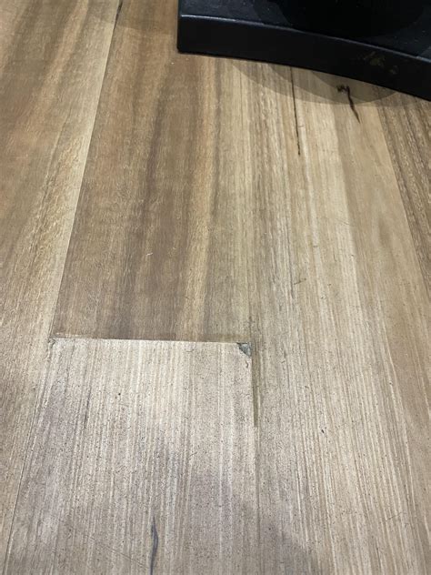 Rug over Damaged lvp/ hybrid flooring : r/Flooring