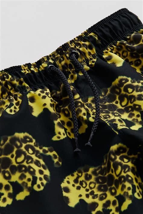 Black/leopards Patterned Swim Shorts for kids | H&M CA