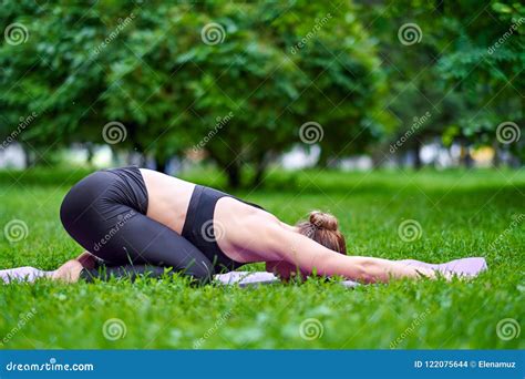 Yoga Child Pose - Balasana. Young Woman Practicing Yoga Meditation in ...