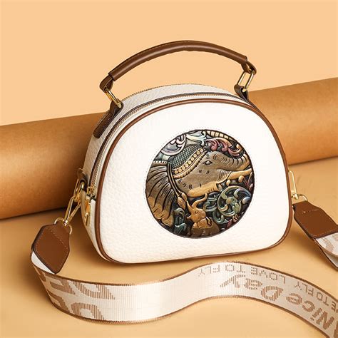 Buy White Xari 2 Zipper Sling Bag at RIJAC