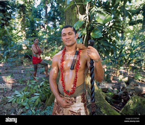 Samoan in traditional dress with staff; Upolu Island, Samoa Stock Photo ...
