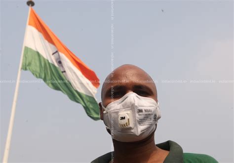 Buy People wearing pollution masks in New Delhi Pictures, Images ...