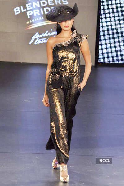Malaika (L) and Amrita Arora (R) showcase creations by designer Mandira ...