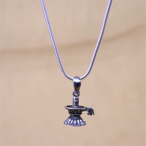 The Spiritual Significance of Wearing a Silver Shiva Linga Pendant Loc