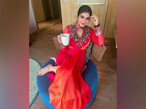 Check out how Raveena Tandon relaxes on a rainy day