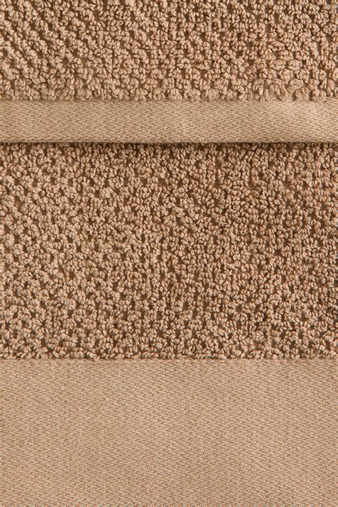Cotton terry hand towel - Beige - Home All | H&M IN
