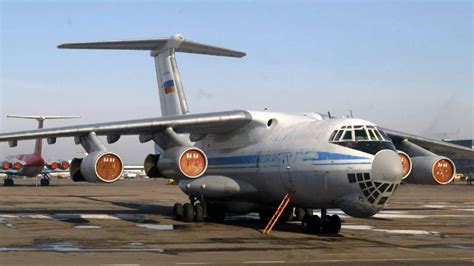 Russian military plane carrying 65 Ukrainian prisoners of war crashes ...