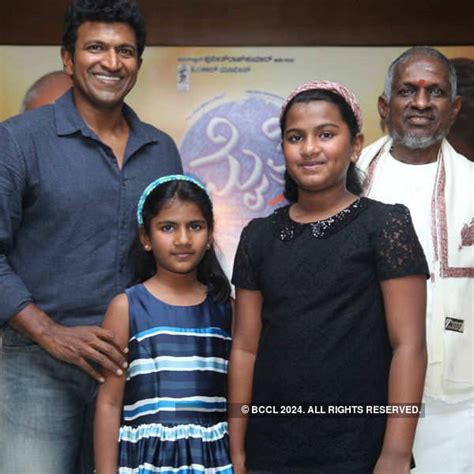 Puneeth Rajkumar with his daughters Driti and Vandita during the audio ...