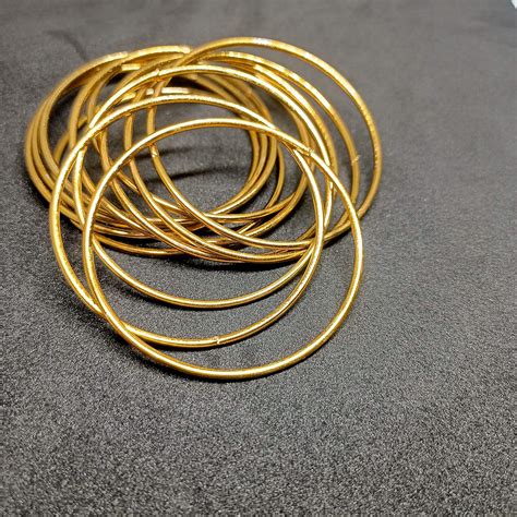 Buy NAVMAV Beautiful & Elegent Chudi Golden Glossy Antique Ethnic ...