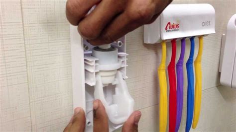 How Do You Set Up a Toothpaste Dispenser 的图像结果