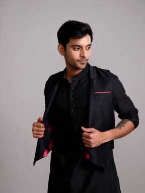 Gulmohar overlapped jacket with mandarin collar straight kurta paired