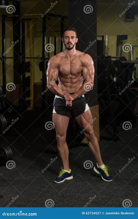 Handsome Body Builder Making Most Muscular Pose Stock Image - Image of ...