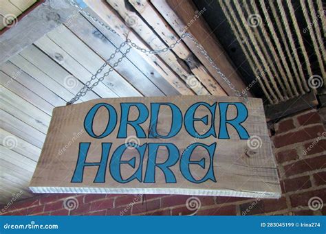 Order Here Sign Hanging on from Ceiling Stock Image - Image of business ...