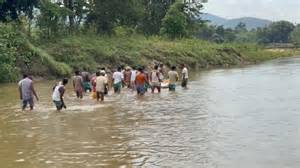 Assam: Dilapidated road to Talaguri crematorium causes agony for ...