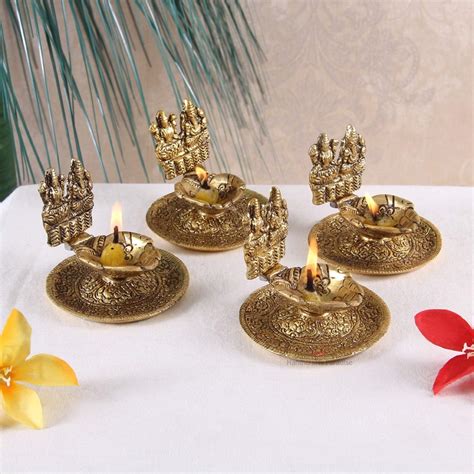 Buy Handicrafts Paradise Lakshmi Ganesh Gold Plated Aluminum Hand Diya ...