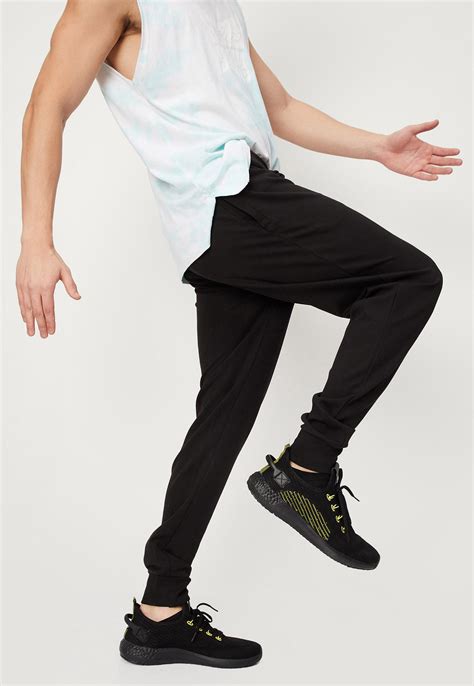 Buy Men Solid Athleisure Cargo Joggers Online at just Rs. 1299.0 ...