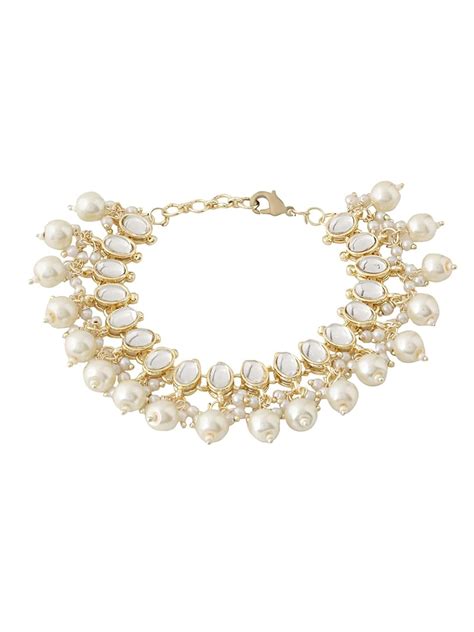 Buy Yellow Chimes Bracelets for Women Gold Toned Kundan Studded Pearl ...