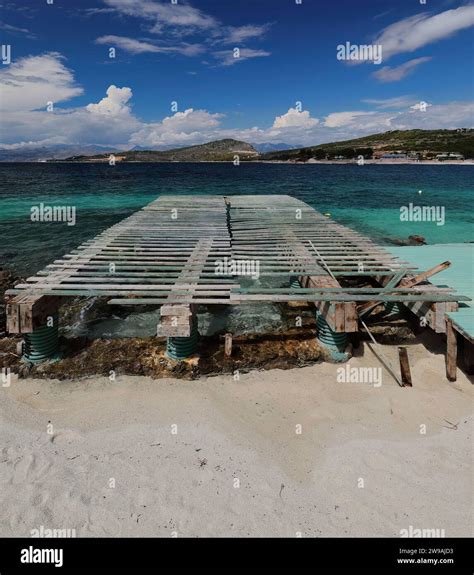 173 Old bathing pier going into the water, Rilinda beach facing the bay ...