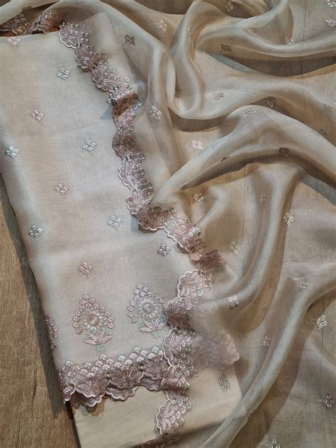 Organza silk multi embroidery work unstitched Suit – fab-persona