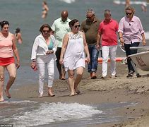Image result for Nancy Pelosi Italy Beach