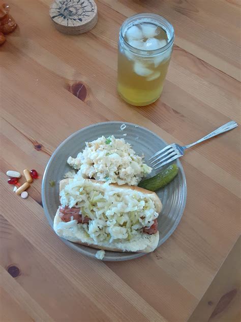 Sausage with kraut and tater salad. Vitamins and Green tea for the win ...