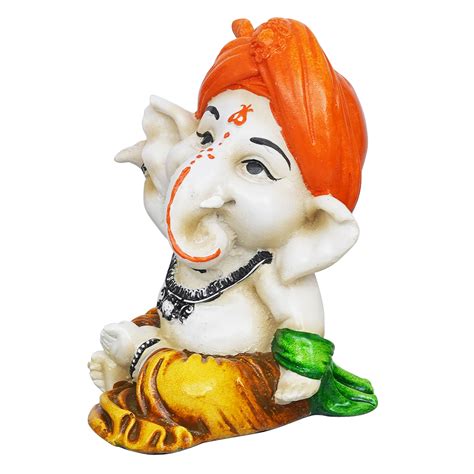 eCraftIndia Orange Polyresin Handcrafted Dancing Lord Ganesha Idol whi