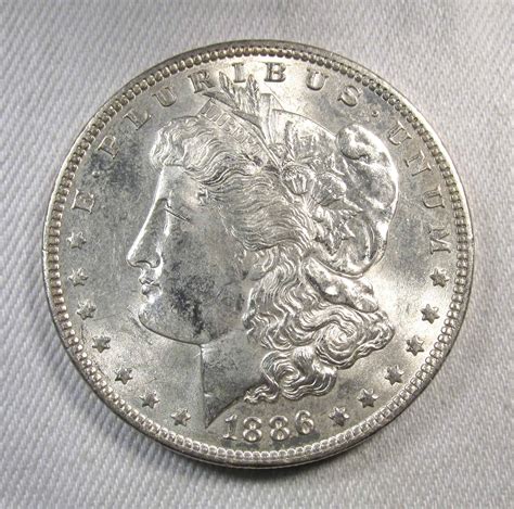 1886 Silver Morgan Dollar VCH AU Coin AS582 - Decatur Coin and Jewelry