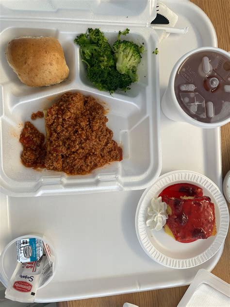 The Med, Memphis, TN, USA. Lasagna, broccoli, roll, strawberry ...