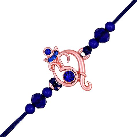 Buy Mahi Rose Gold Plated Om and Ganpati Rakhi with Blue Crystals for ...