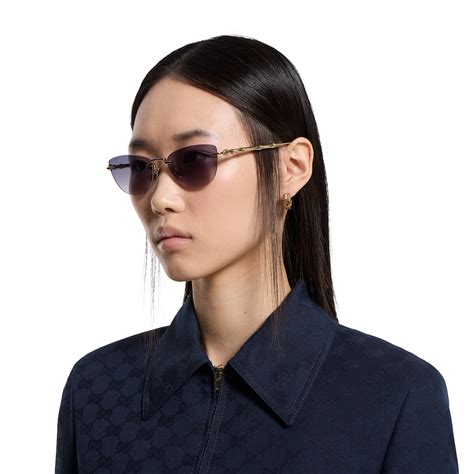 Occhiali da sole cat-eye in oro | GUCCI® IT