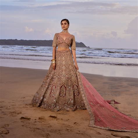 Heavily Gold Embellished Bridal Lehenga in Shades of Pink – Suvidha Fashion