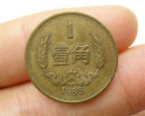 1999年的菊花1角硬币，现在一枚能值多少钱？现在知道也不晚_腾讯新闻