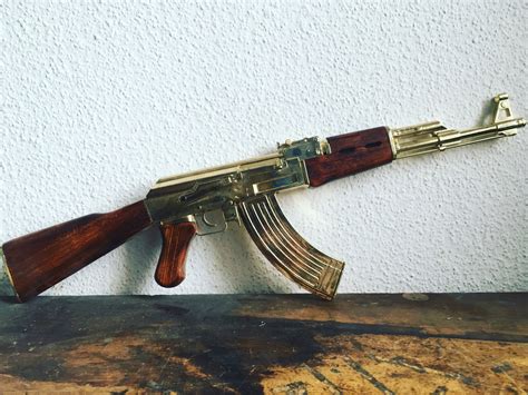 Golden AK47 fixed stock, assault rifle model AK-47