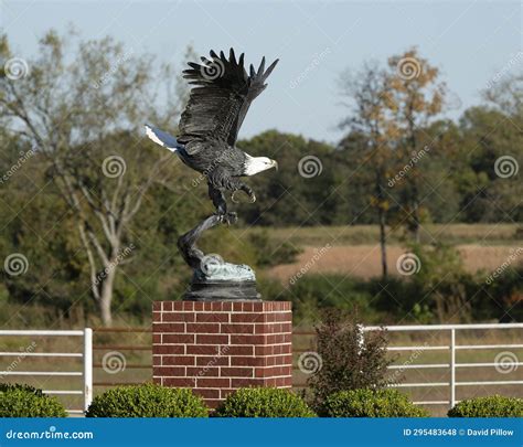 Bronze Eagle Sculpture on a Brick Pedestal in Front of the Bank of ...