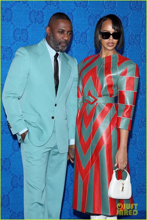 https://cdn.justjared.com/wp-content/uploads/2023/01/elba-gucci/idris-elba-sabrina-elba-gucci-fashion-show-in-milan-10.jpg?utm_source=chatgpt.com