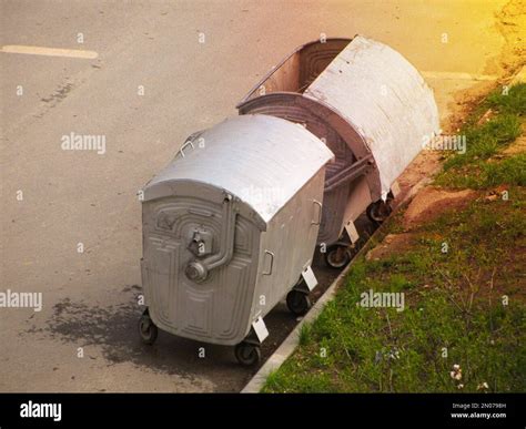 Two modern metal trash bins, top view. Ecology, garbage collection ...