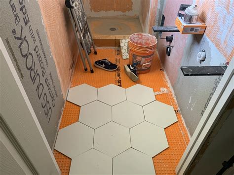 Installing Hexagonal Floor Tile 的图像结果