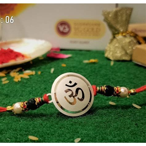 Buy quality silver om gents rakhi RH-GA695 in Ahmedabad