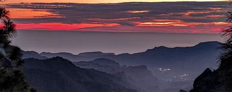 Download wallpaper 2560x1024 settlement, hills, mountains, sunset ...