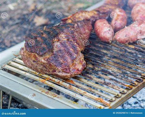 Slow Grilling Chorizo Sausages , Chicken Quarters, Skirt and Flank ...