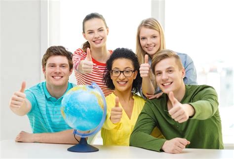 Education, travel and geography concept - five smiling student with ...