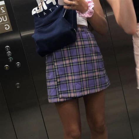 Pics of the purple plaid brandy skirt on - Depop