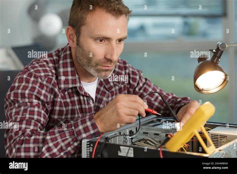 Image result for Man Repairing Computer
